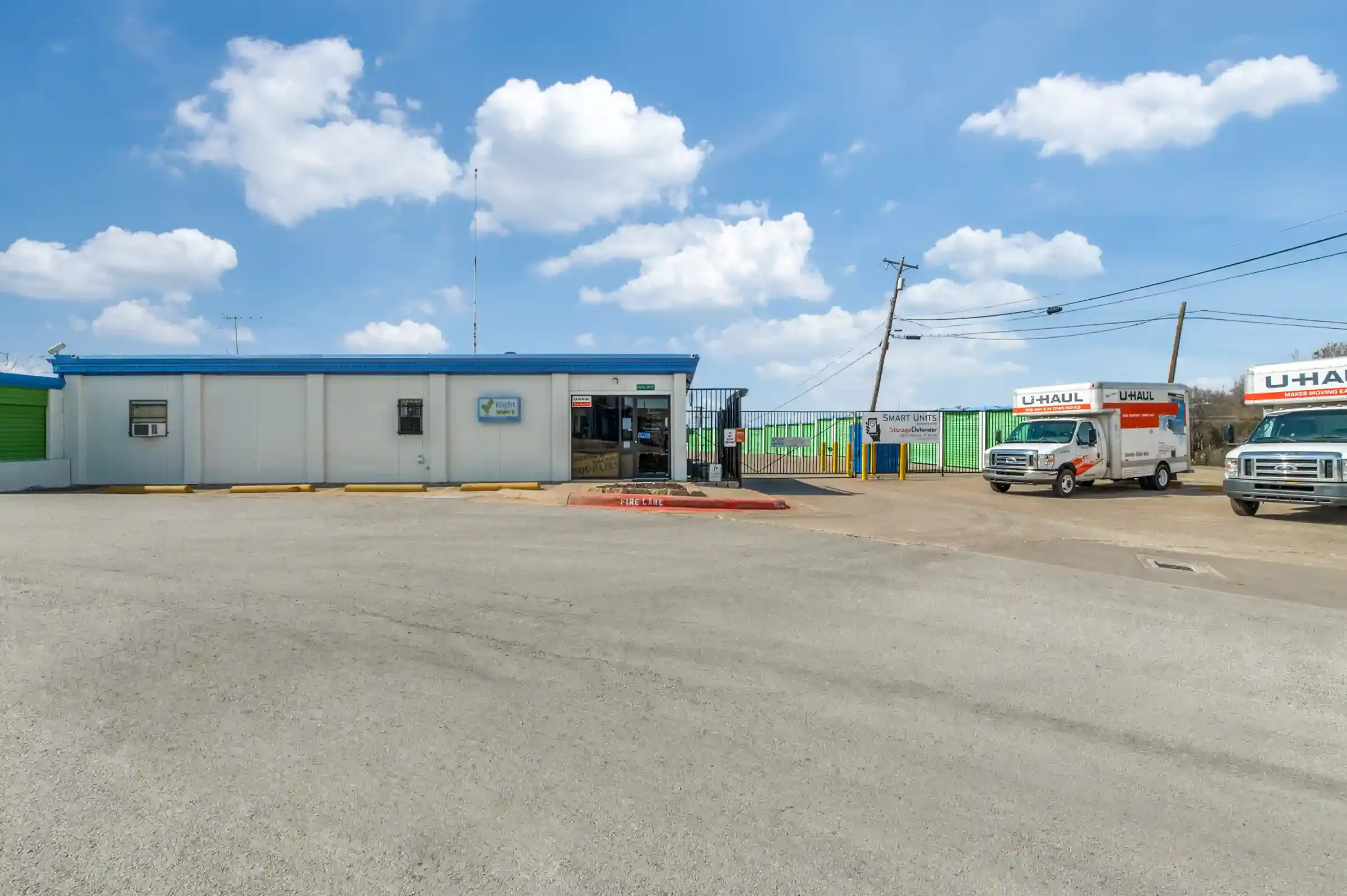storage facility with u hauls parked in front