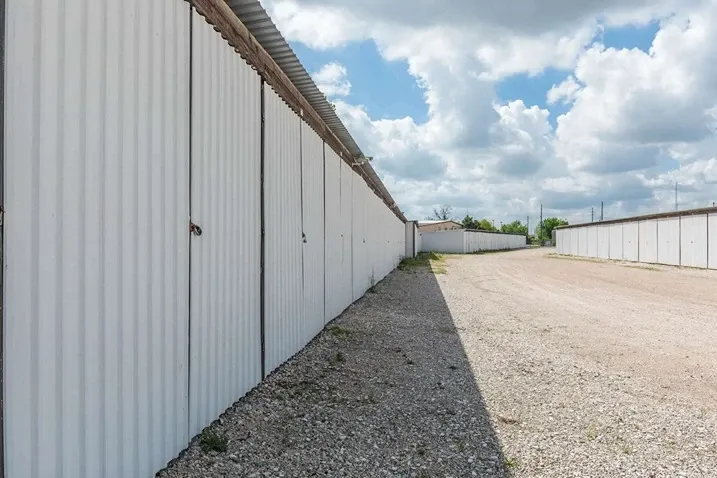 row of self storage units with drive up