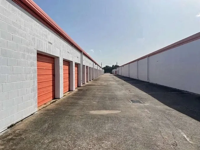 row of self storage units with drive up