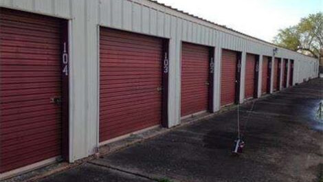 row of self storage units with drive up